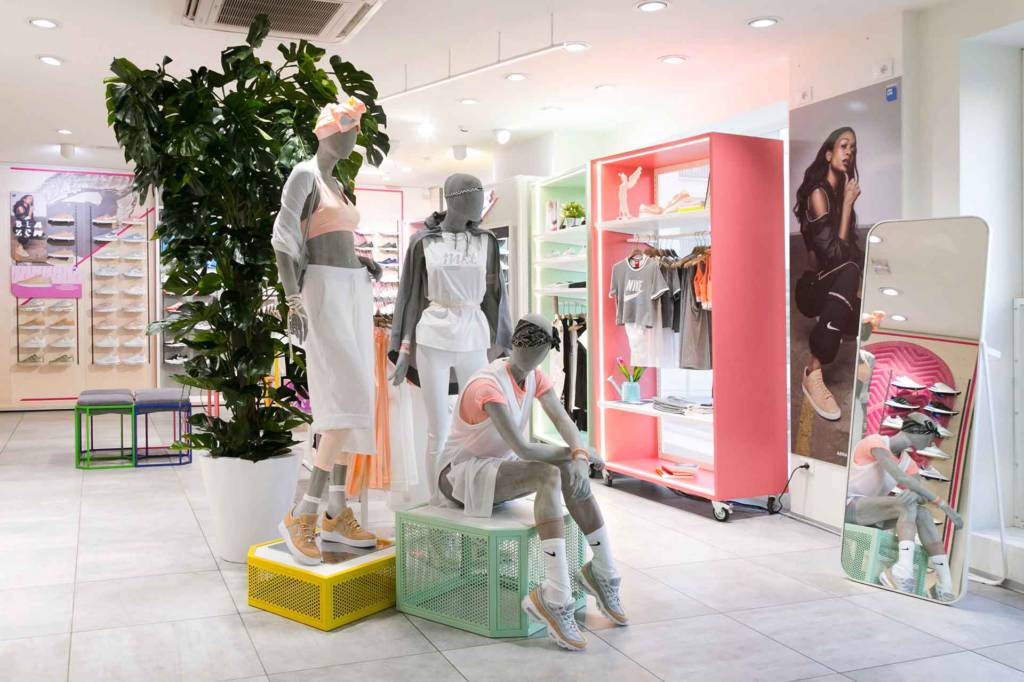 Nike AW Lab corner in via Torino Milan with grouped mannequins and coloured furniture by VANDA