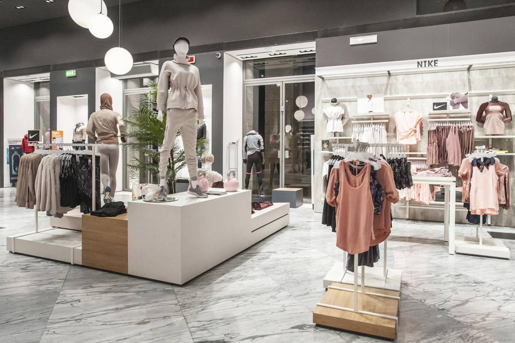 Nike corner at Cisalfa Roma Eur with podium mannequin and pendant lighting designed by VANDA