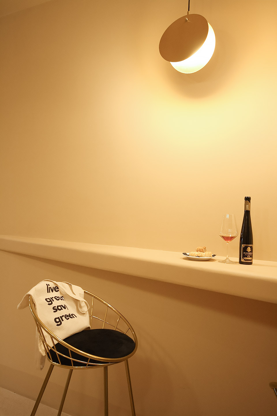 Detail of product display and organic curved wall, Cannoncino Piacenza
