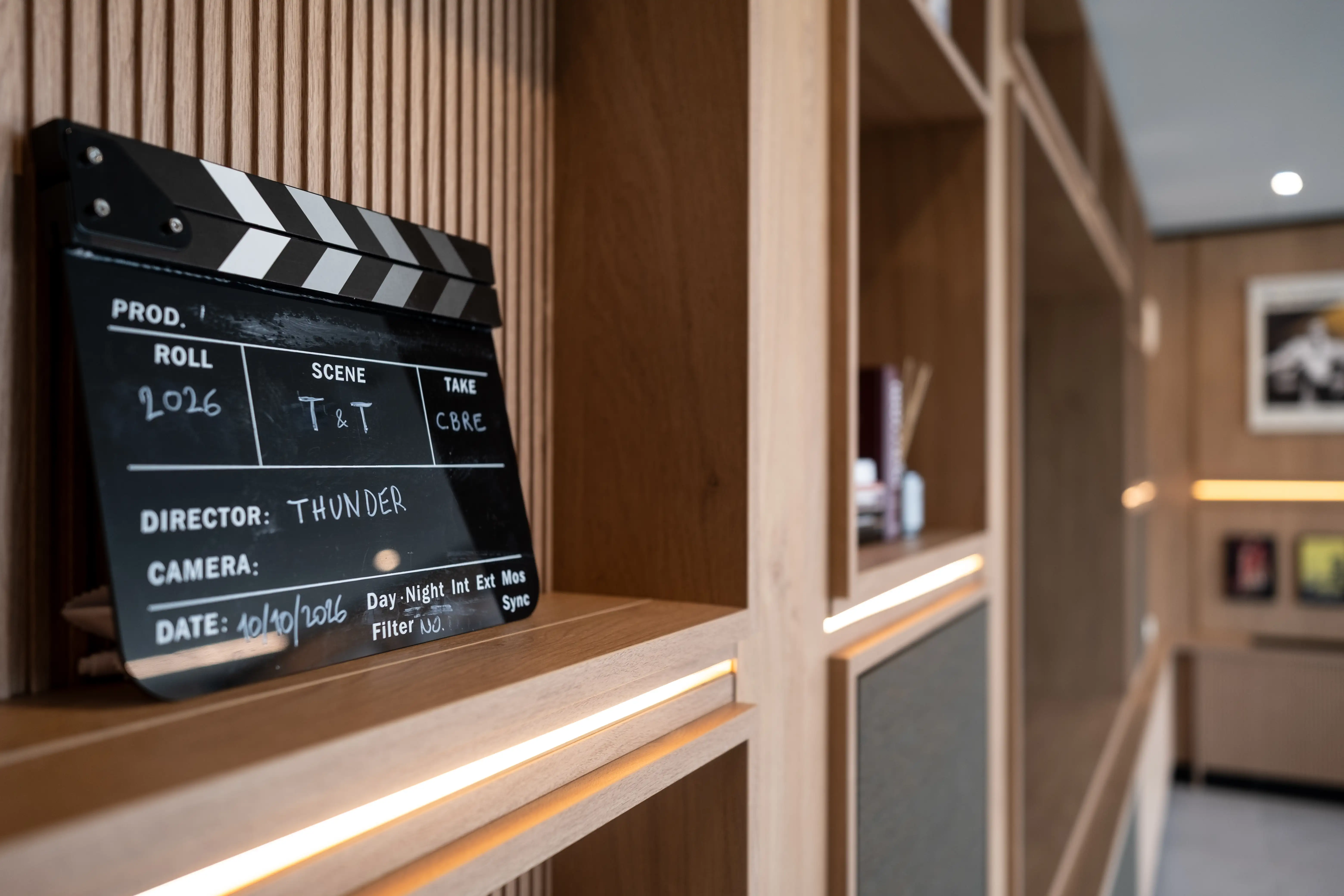Livinup Milan amenities cinema room closeup props boiserie in warm wood